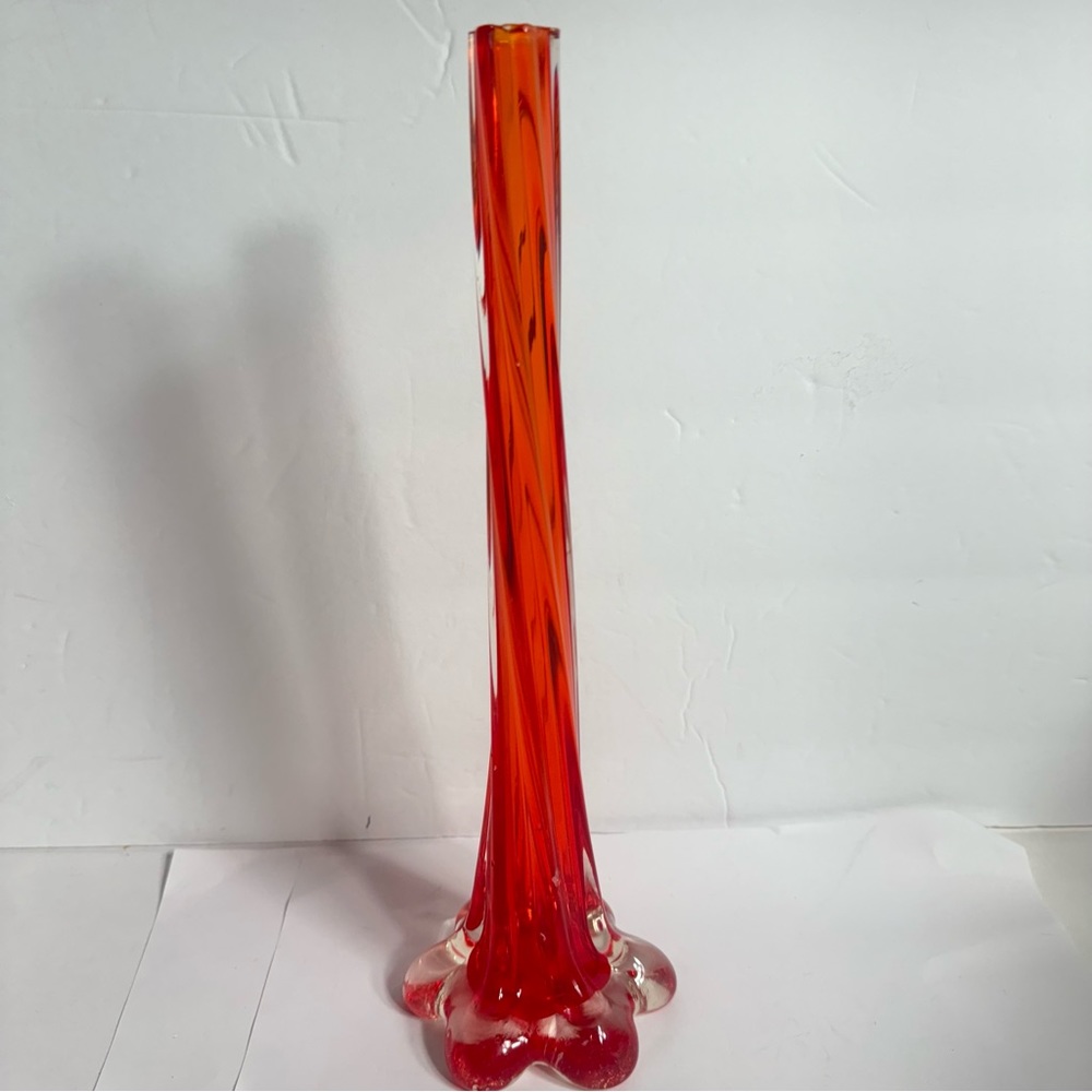 Tall thin glass wide petal-footed vase. Approx. 11”H.